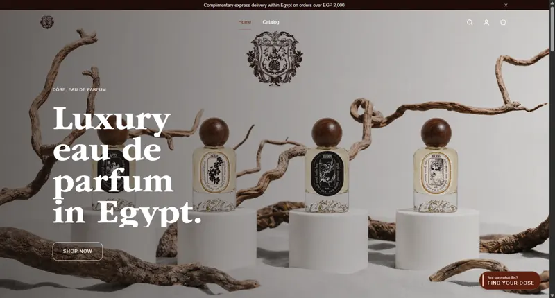DÖSE homepage hero: eau de parfum bottles staged as still life on sand with driftwood